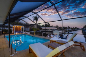 Villa Come Inn Sun - Gym, Kayaks, Heated Pool & Spa with Gulf Access - Roelens Vacations